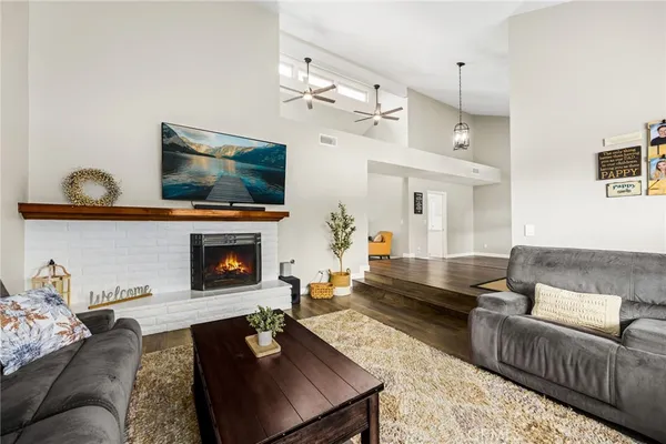 a kitchen with stainless steel appliances white cabinets and a stove