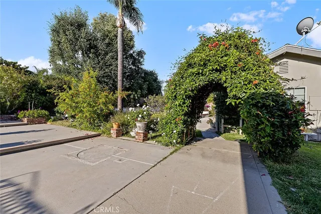 a living room with furniture or couch and a wooden floor