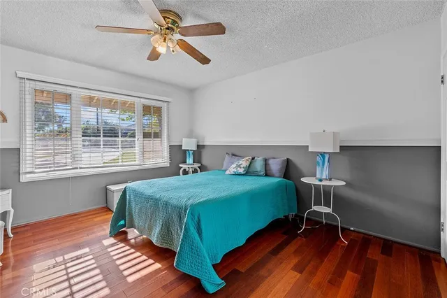 a kitchen with stainless steel appliances granite countertop a sink a stove and cabinets