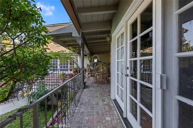 a front view of house with yard and outdoor seating