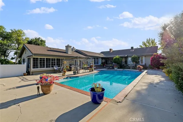 a bathroom with a sink a mirror and a shower