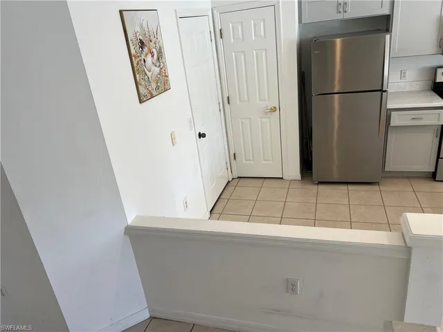 a view of a kitchen with a sink and dishwasher