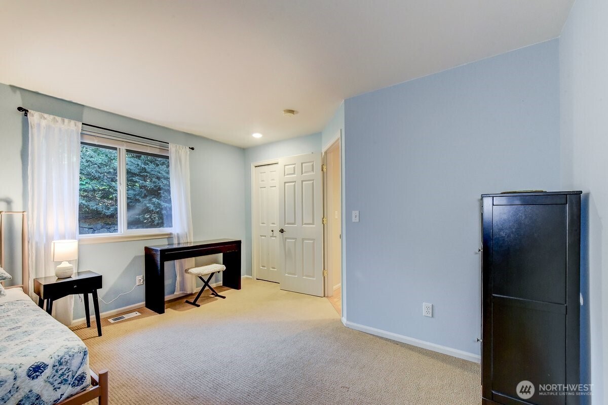 20019 27th Drive Southeast Bothell, WA 98012 - Photo 22 of 36 a view of a livingroom with furniture and a window