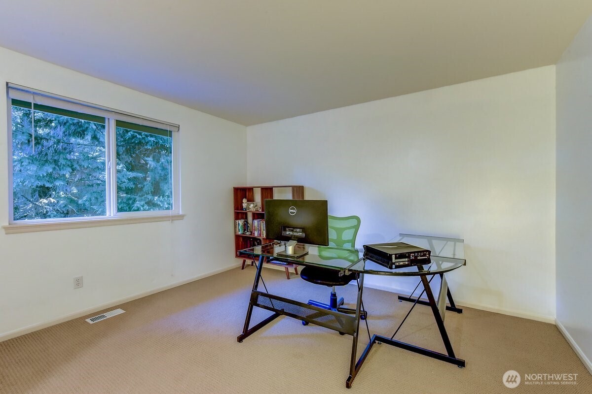20019 27th Drive Southeast Bothell, WA 98012 - Photo 26 of 36 a work room with furniture and a window
