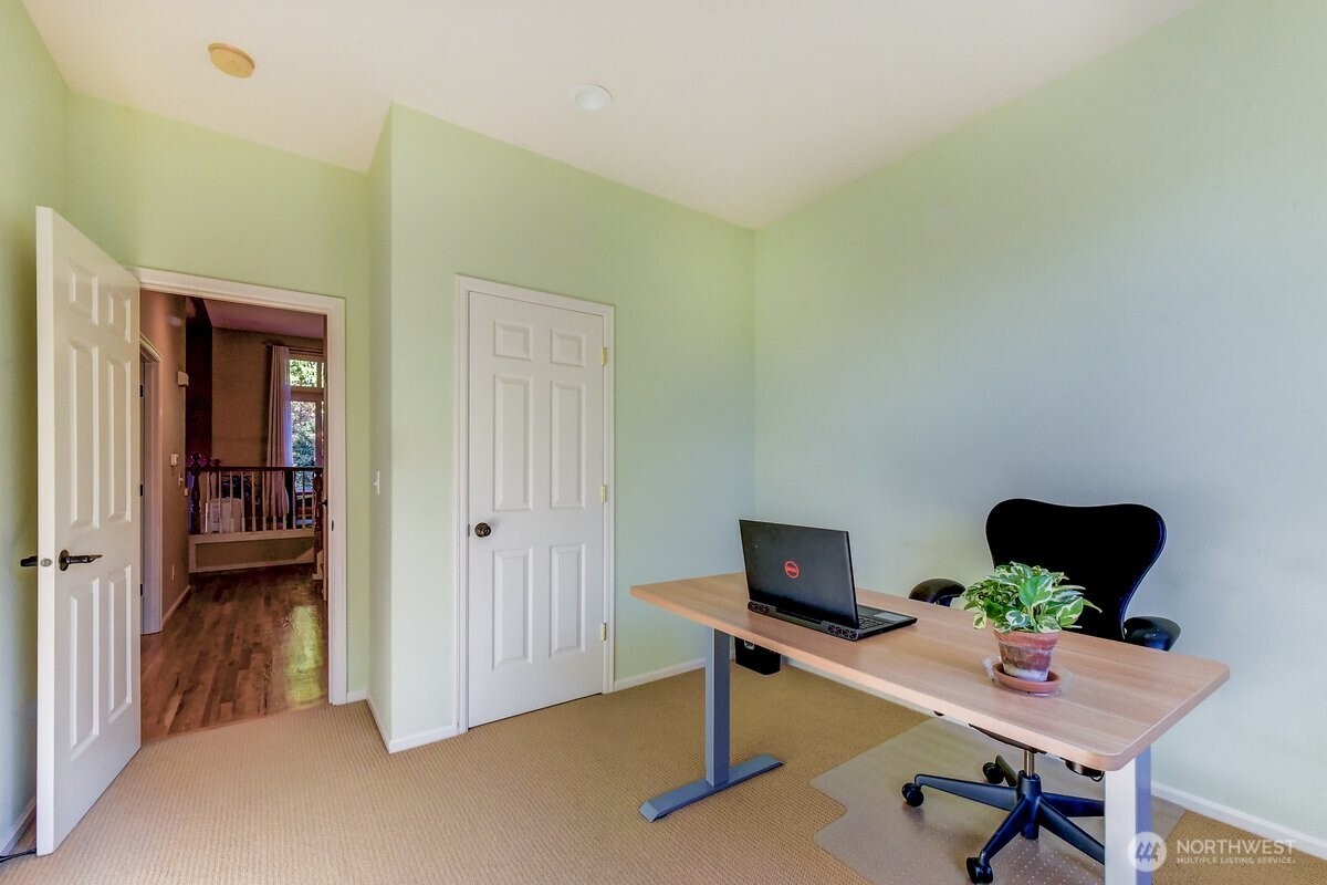 20019 27th Drive Southeast Bothell, WA 98012 - Photo 30 of 36 a view of a workspace with furniture and a window