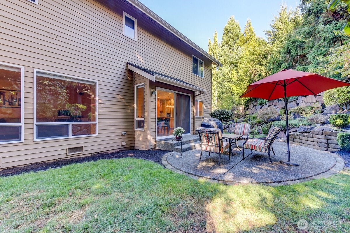 20019 27th Drive Southeast Bothell, WA 98012 - Photo 33 of 36 a view of a house with backyard porch and sitting area