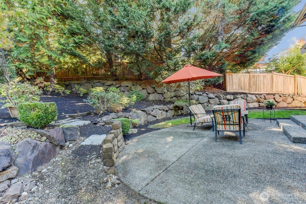 20019 27th Drive Southeast Bothell, WA 98012 - Photo 36 of 36 a view of a backyard with sitting area and furniture