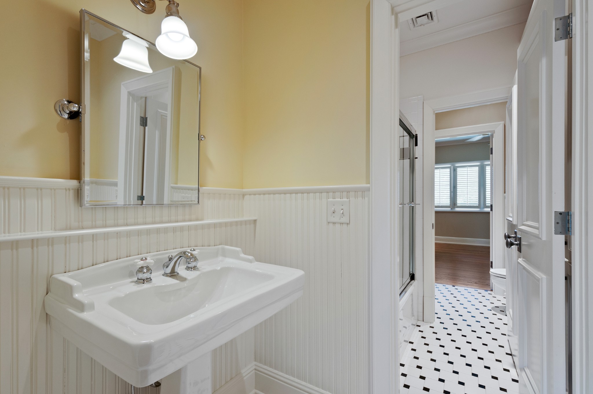 4816 Post Road Nashville, TN 37205 - Photo 34 of 54 a bathroom with a sink a mirror and a shower