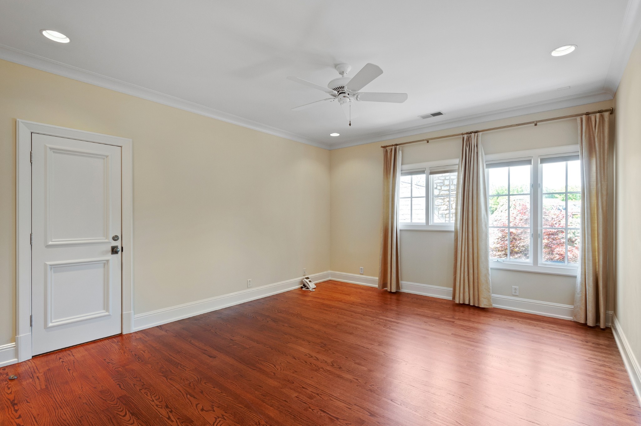 4816 Post Road Nashville, TN 37205 - Photo 35 of 54 an empty room with wooden floor and windows
