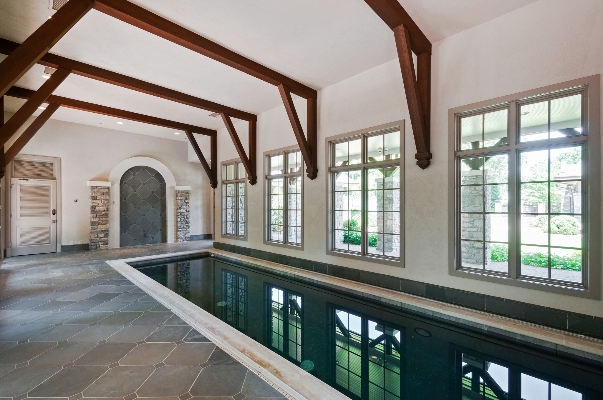 4816 Post Road Nashville, TN 37205 - Photo 38 of 54 a view of a balcony with furniture and large windows