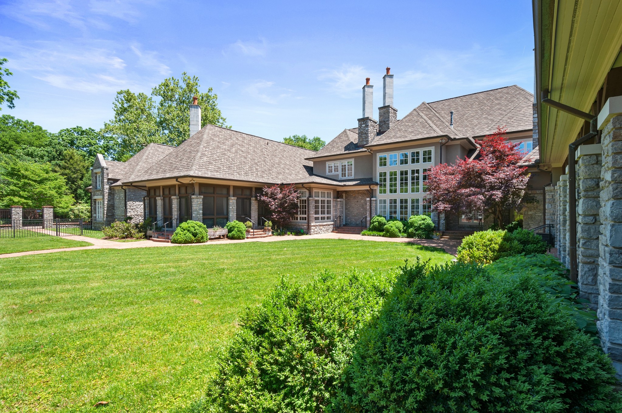 4816 Post Road Nashville, TN 37205 - Photo 47 of 54 a front view of a house with garden