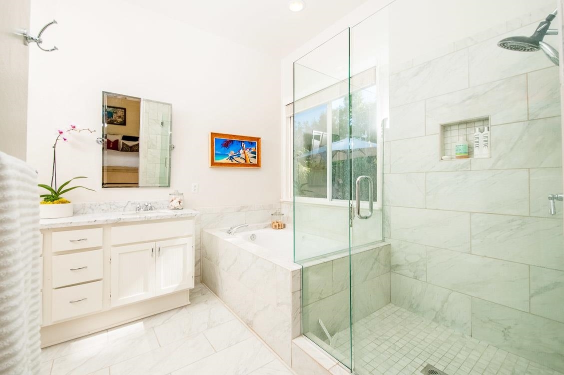 1018 Alexandra Lane Encinitas, CA 92024 - Photo 11 of 18 Carerra marble counter tops and carerra tile suround