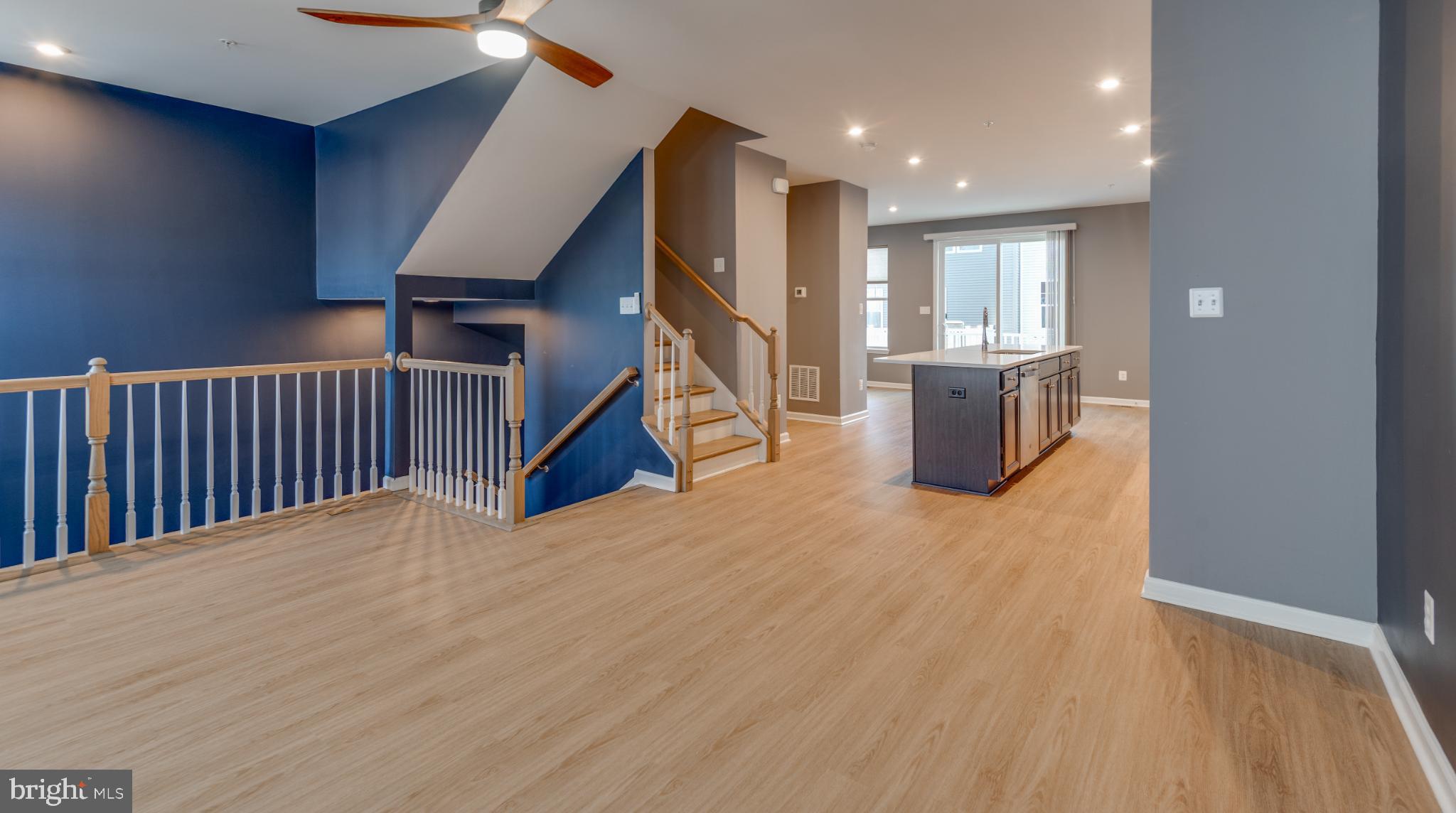 44596 Nolani Way California, MD 20619 - Photo 4 of 31 a view of kitchen and hall with wooden floor