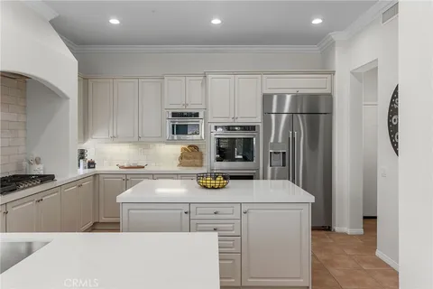 a view of a hallway with windows