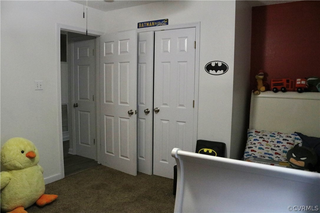 20434 Horseshoe Road Carson, VA 23830 - Photo 15 of 28 a view of livingroom with baby crib