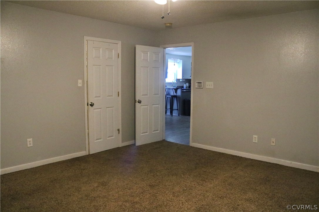 20434 Horseshoe Road Carson, VA 23830 - Photo 21 of 28 an empty room with closet area