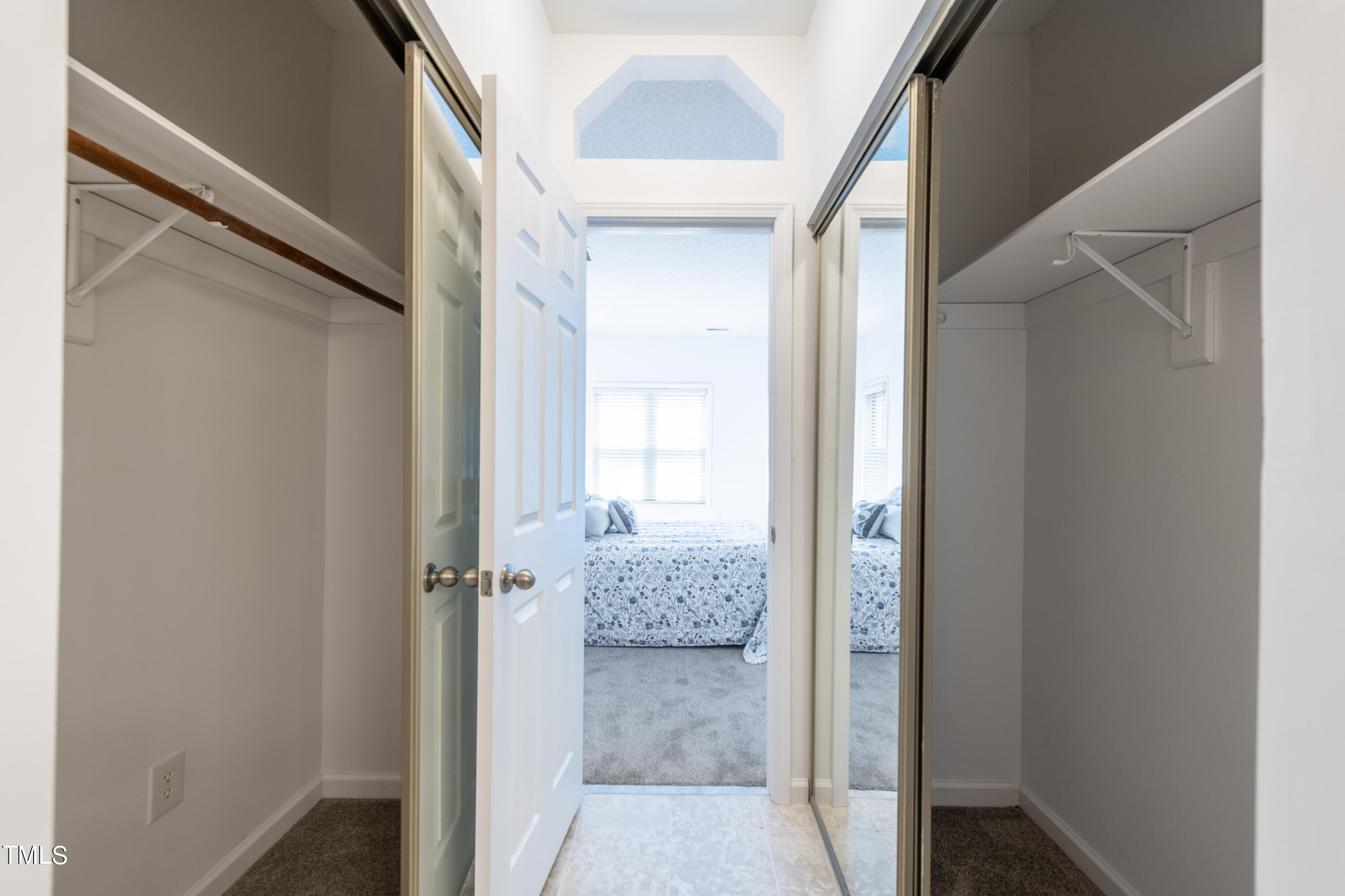 6121 Sunpointe Drive, Unit 102 Raleigh, NC 27606 - Photo 18 of 30 Dual Closets to MBR