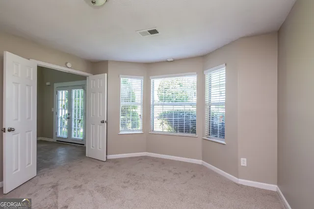 a view of an empty room with window