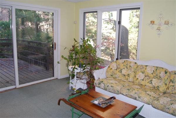 237 East Emerson Road Lexington, MA 02420 - Photo 13 of 22 a living room with furniture and a potted plant