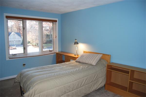 237 East Emerson Road Lexington, MA 02420 - Photo 19 of 22 a bedroom with a bed and window