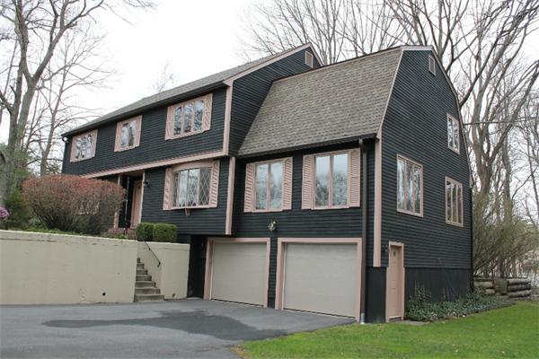237 East Emerson Road Lexington, MA 02420 - Photo 2 of 22 a front view of a house with garden