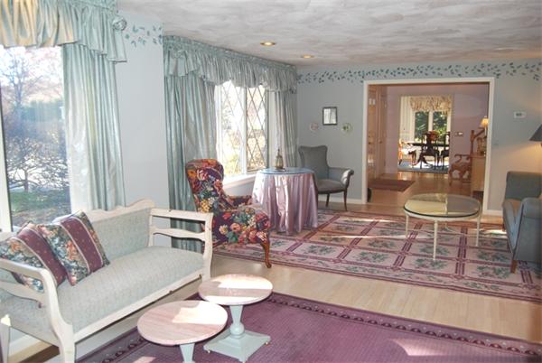 237 East Emerson Road Lexington, MA 02420 - Photo 3 of 22 a living room with furniture and a large window