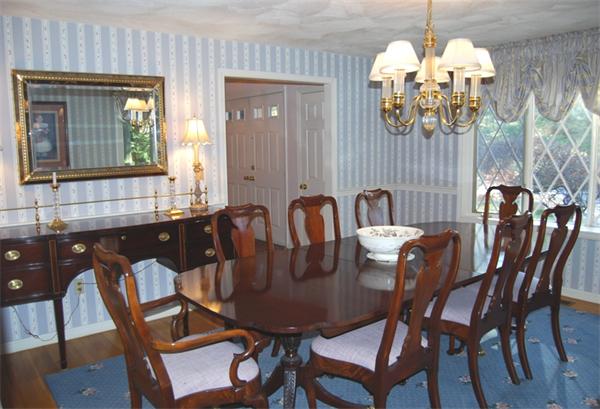 237 East Emerson Road Lexington, MA 02420 - Photo 5 of 22 a view of a dining room with furniture and chandelier