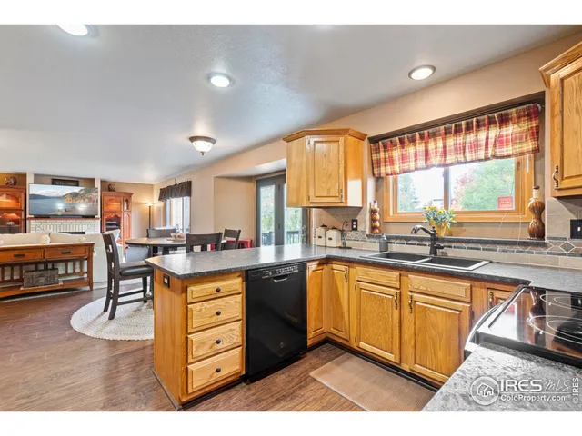 a kitchen with lots of counter top space and dining table