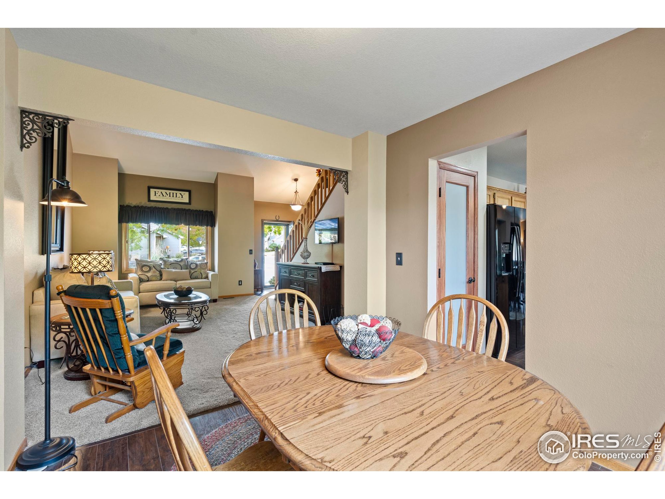 1808 Silvergate Road Fort Collins, CO 80526 - Photo 29 of 42 a view of a dining room with furniture