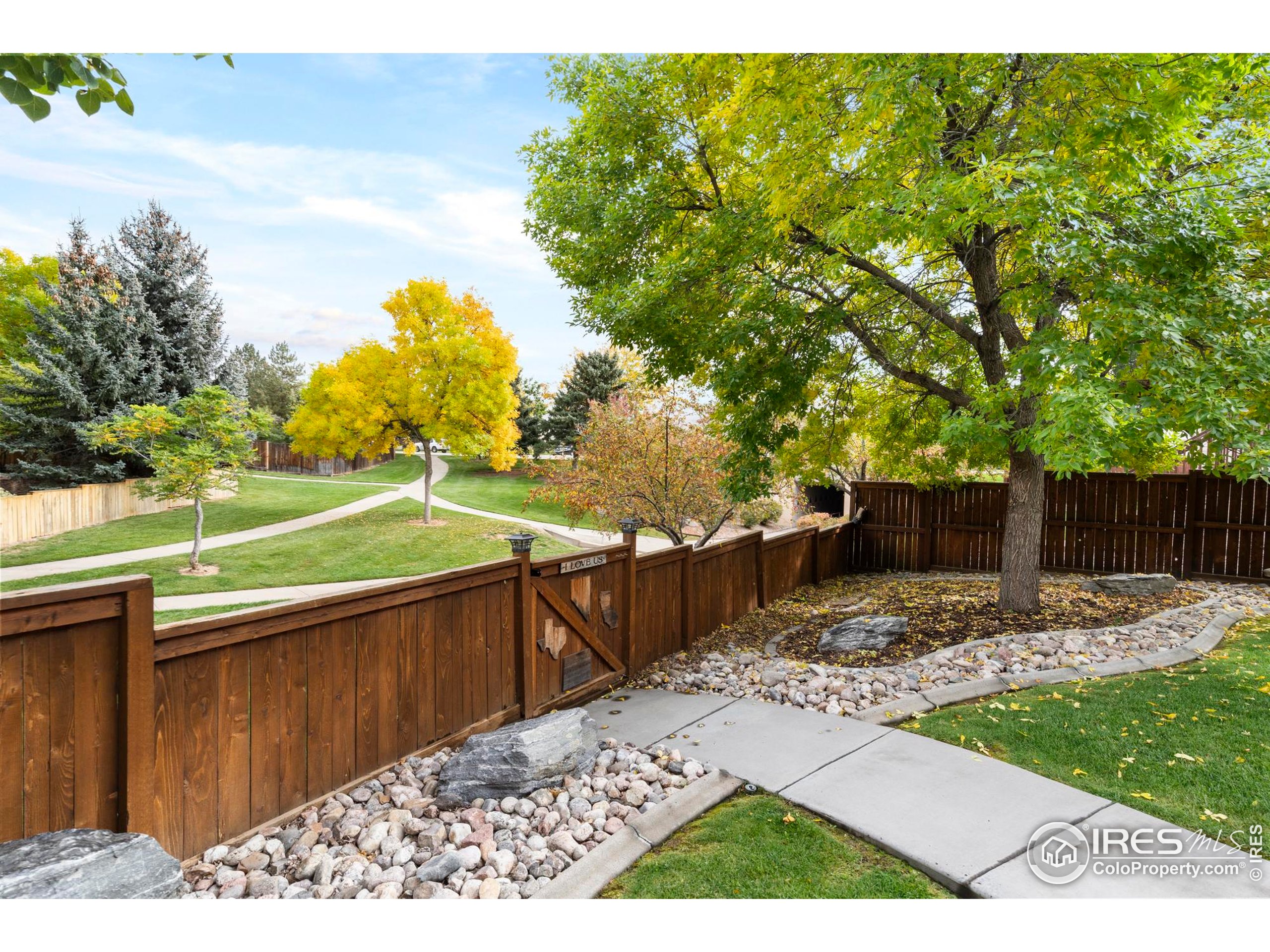 1808 Silvergate Road Fort Collins, CO 80526 - Photo 37 of 42 a view of a backyard with wooden fence