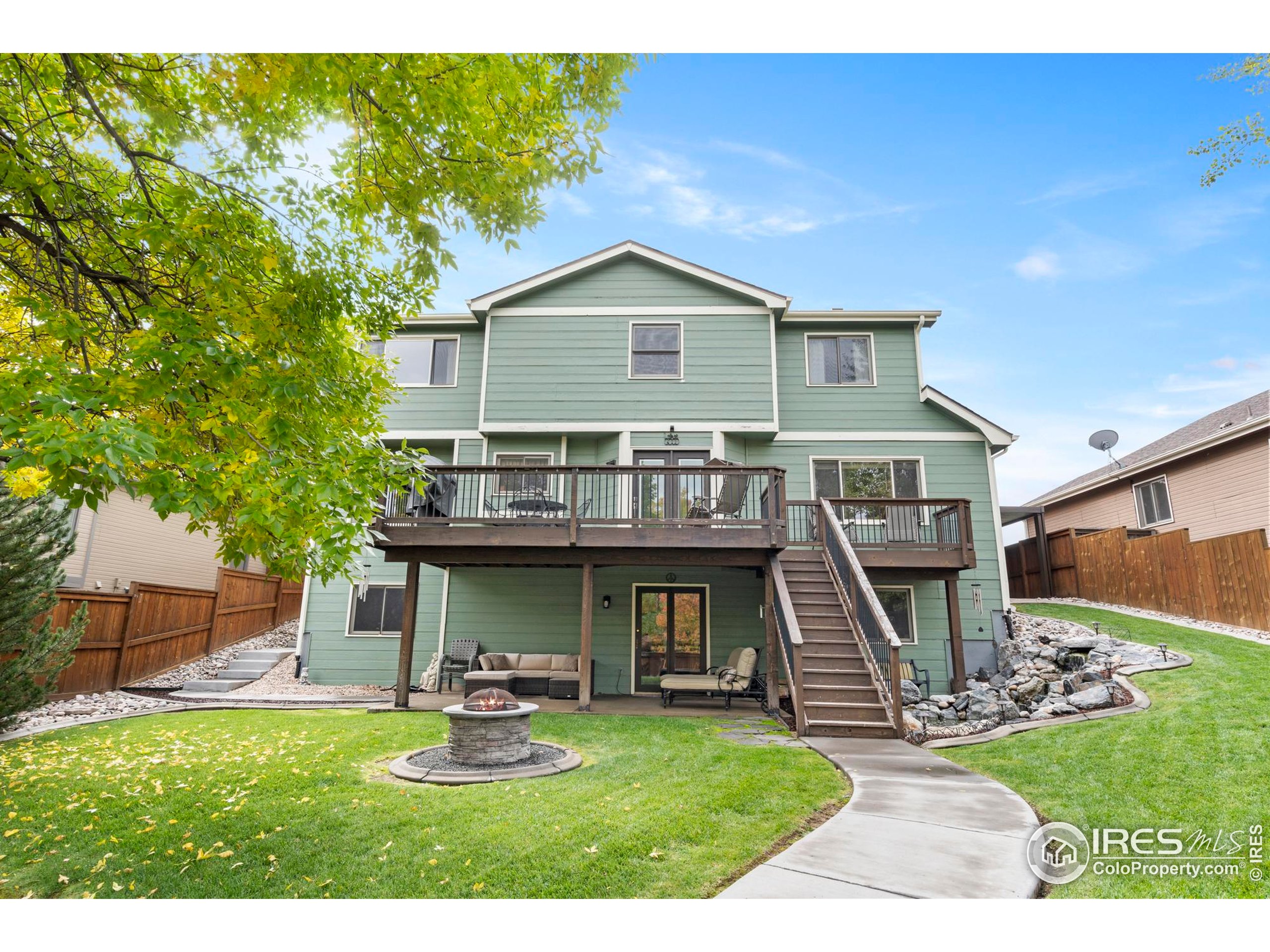 1808 Silvergate Road Fort Collins, CO 80526 - Photo 8 of 42 a view of a house with a yard porch and sitting area