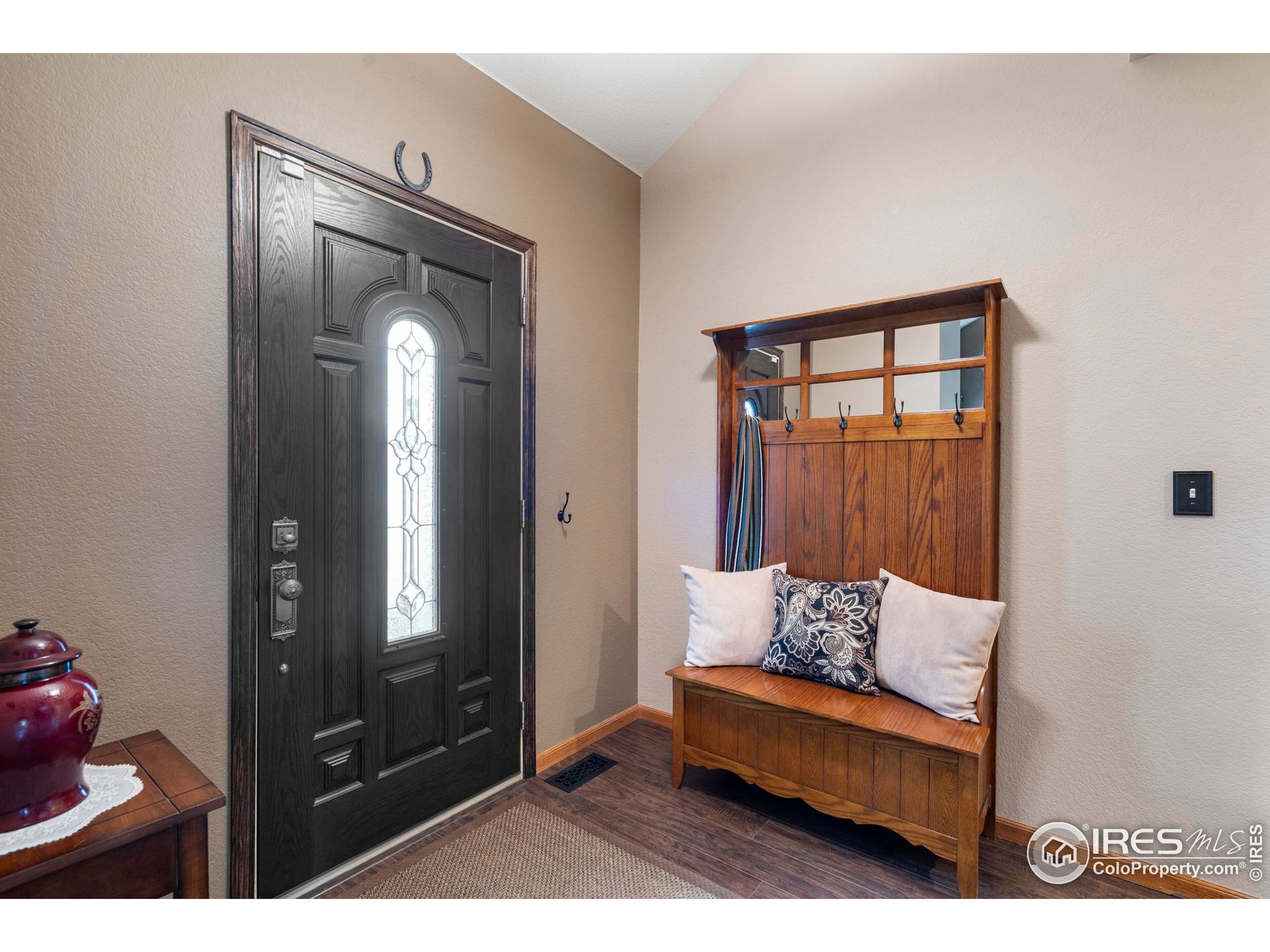 1808 Silvergate Road Fort Collins, CO 80526 - Photo 9 of 42 a living room with furniture and a mirror