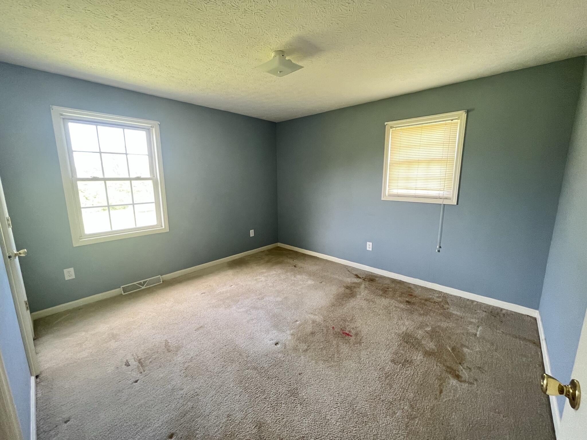 1550 Dry Bridge Road Chatham, VA 24531 - Photo 13 of 16 an empty room with windows