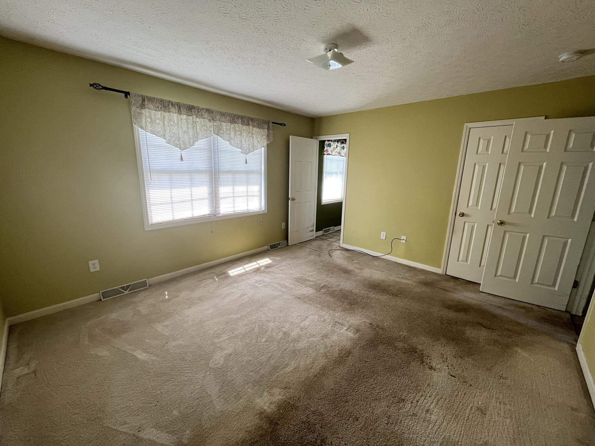 1550 Dry Bridge Road Chatham, VA 24531 - Photo 8 of 16 a view of an empty room with a window