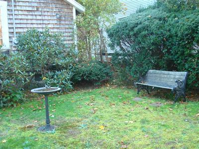19 Park Road Mashpee, MA 02649 - Photo 6 of 10 a garden view with a seating space