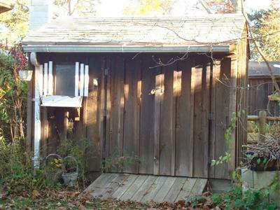 19 Park Road Mashpee, MA 02649 - Photo 8 of 10 a view of a wooden fence next to a yard