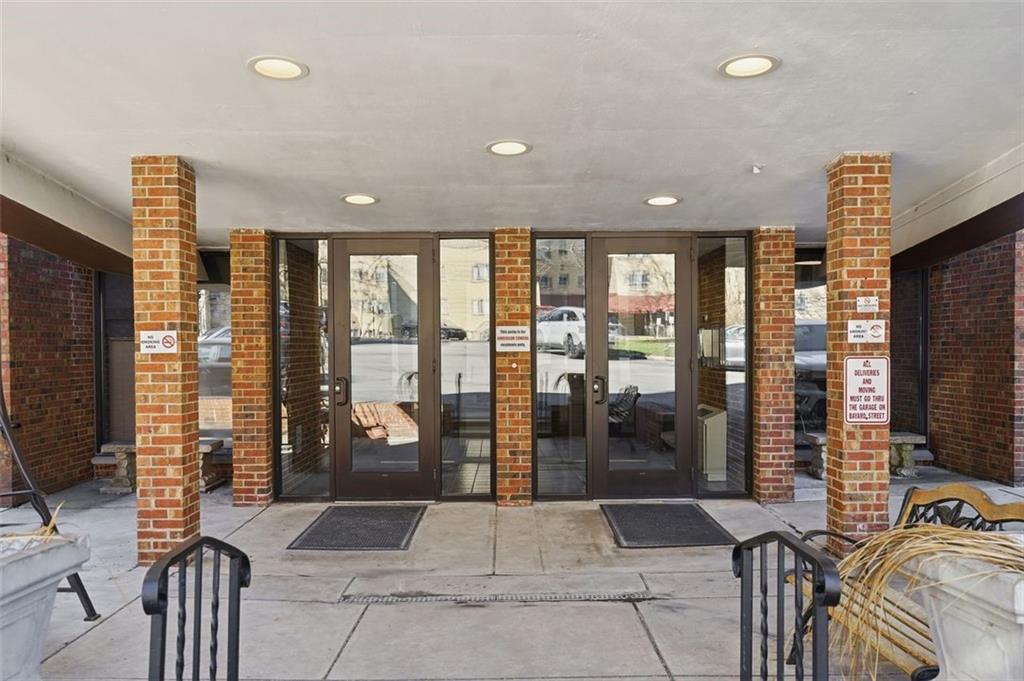 5 Bayard Road, Unit 520 Pittsburgh, PA 15213 - Photo 21 of 25 a lobby with furniture and floor to ceiling window