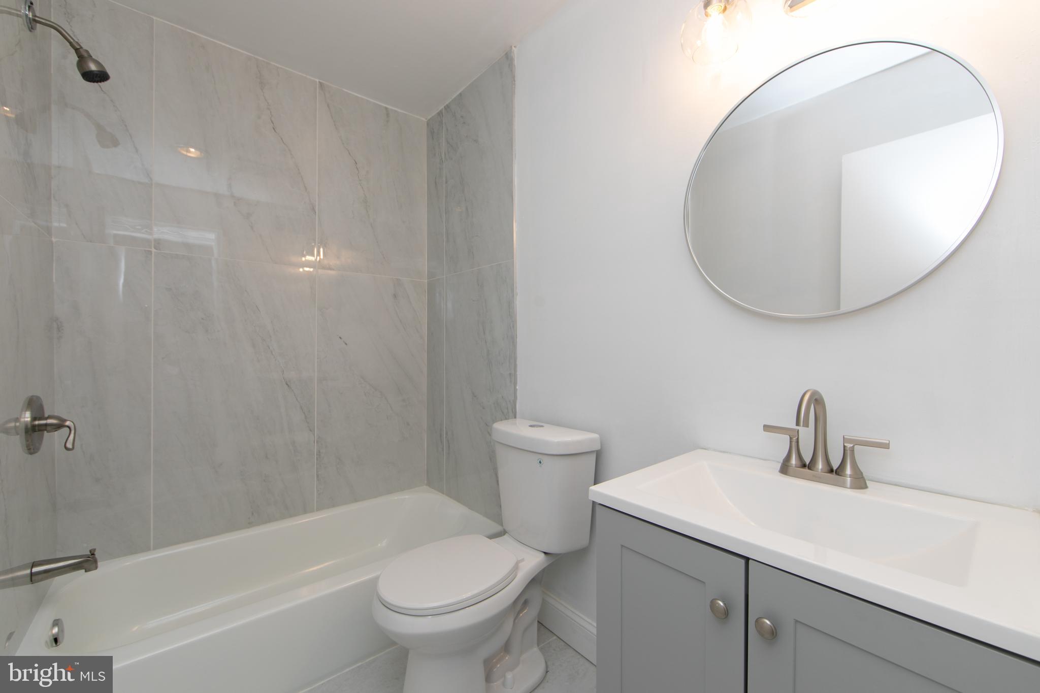 108 Chelsea Circle Clementon, NJ 08021 - Photo 16 of 19 a bathroom with a sink a toilet and a mirror