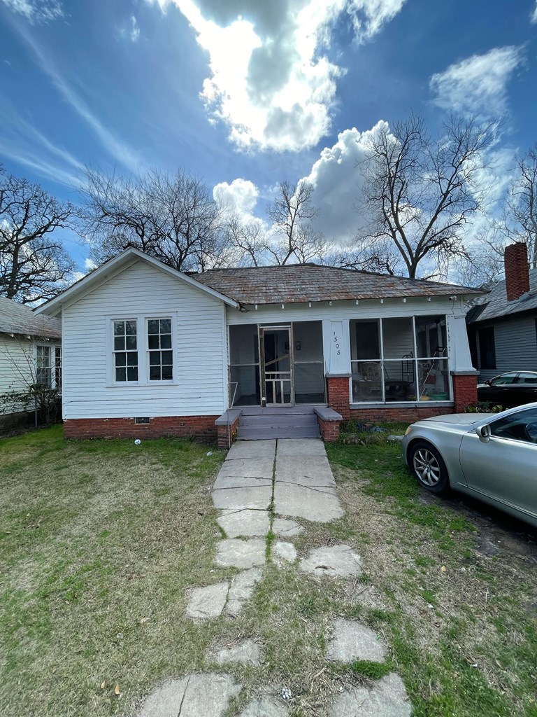 1308 20th Street Columbus, GA 31901 - Photo 2 of 4 a view of a yard in front of a house