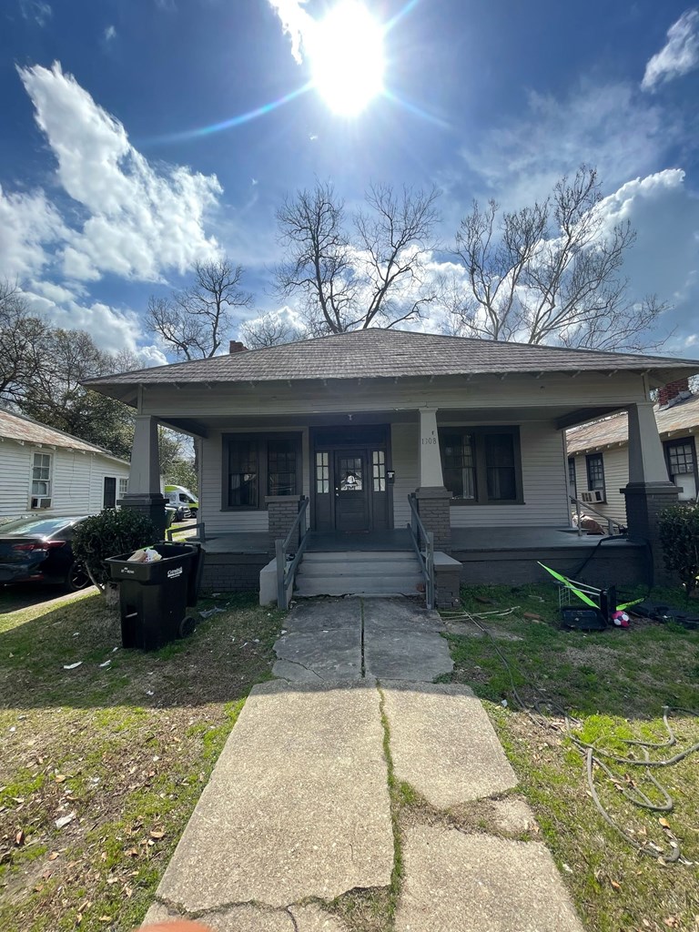 1308 20th Street Columbus, GA 31901 - Photo 3 of 4 a view of a house with a yard and sitting area