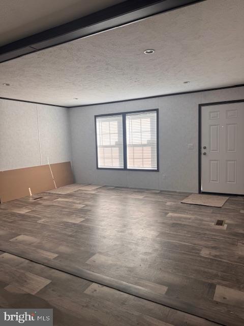 337 Cherry Road Millville, NJ 08332 - Photo 8 of 16 a view of empty room with window and wooden floor