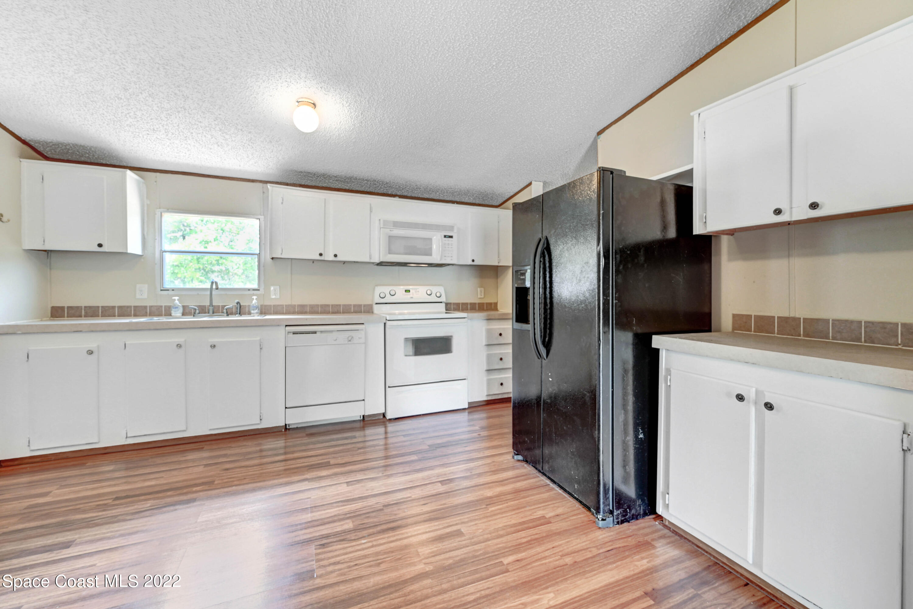 560 Camp Road Cocoa, FL 32927 - Photo 2 of 16 Camp Kitchen 2
