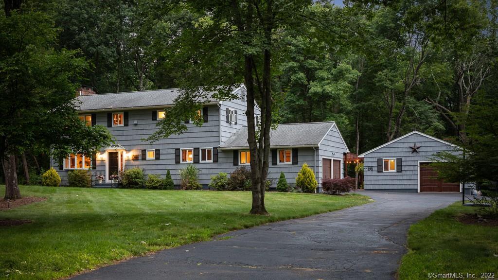 Completely updated Colonial with Lake Rights; bordering 55 acre preserve