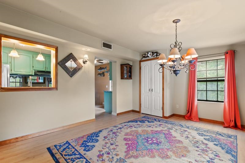 116 Loyola Road St. Augustine, FL 32086 - Photo 19 of 41 a view of a hallway with furniture and window