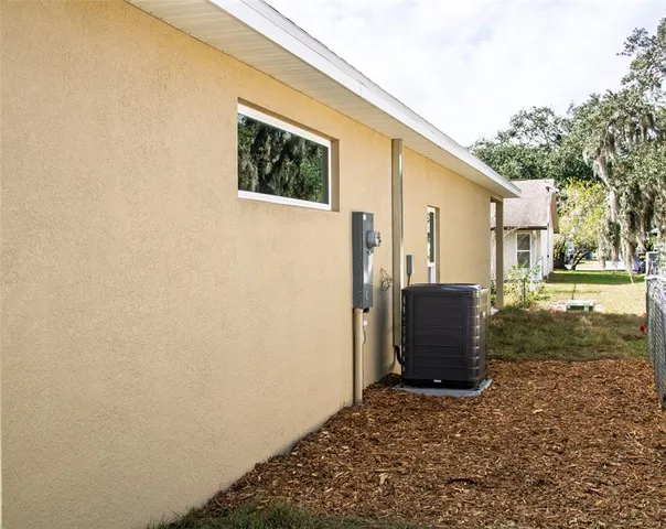 a view of a backyard of the house