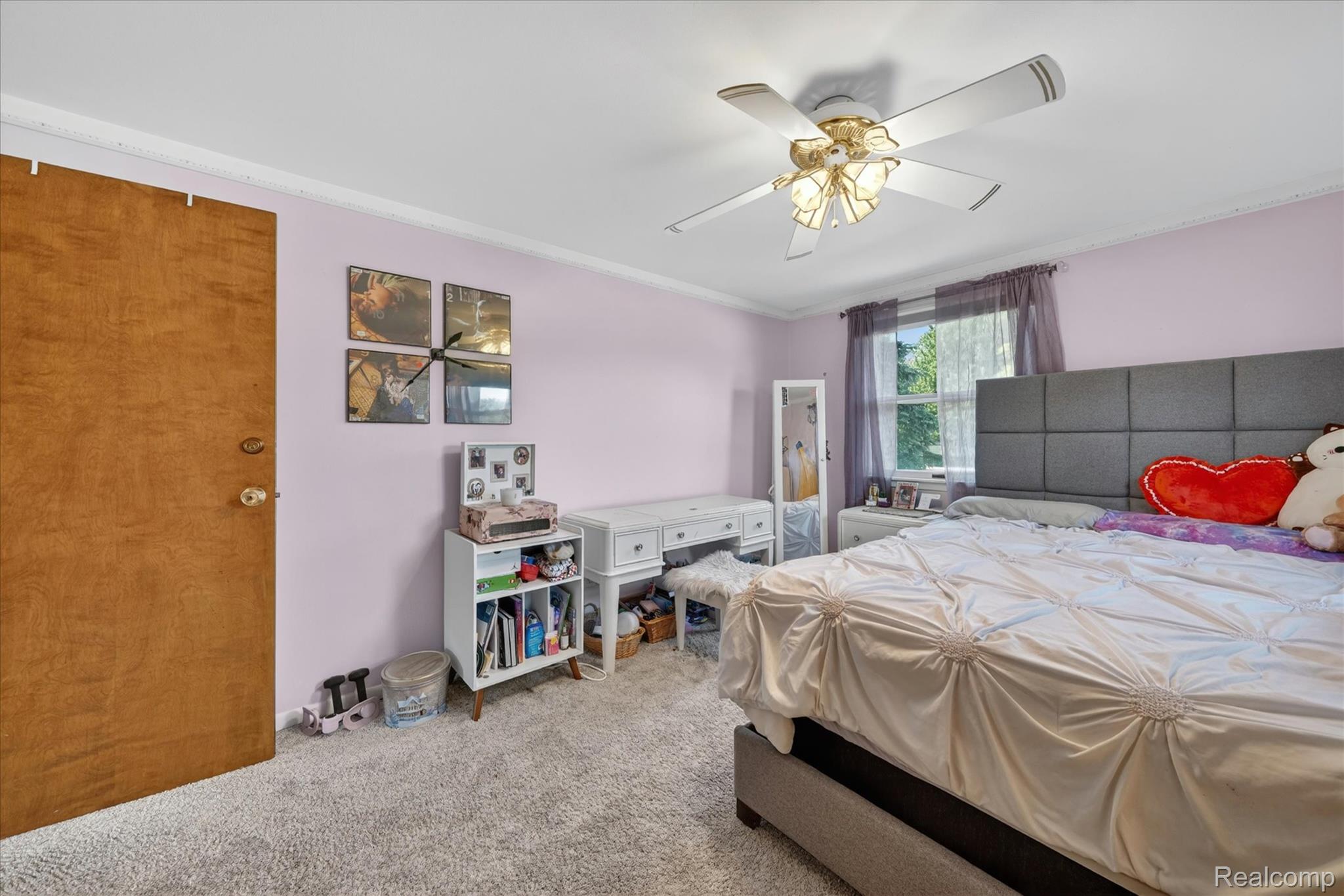 18178 22 Mile Road Macomb, MI 48044 - Photo 30 of 43 Bedroom featuring a ceiling fan with integrated lighting, a window with exterior views, and neutral-toned carpeting