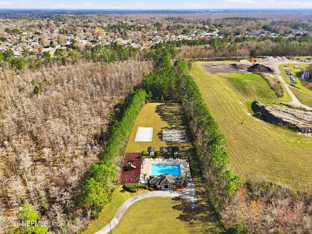 a view of a house with a big yard