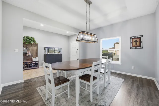 a living room with couch and a window