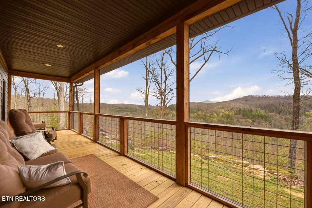1159 Emory Heights Road Lancing, TN 37770 - Photo 30 of 59 screened back deck