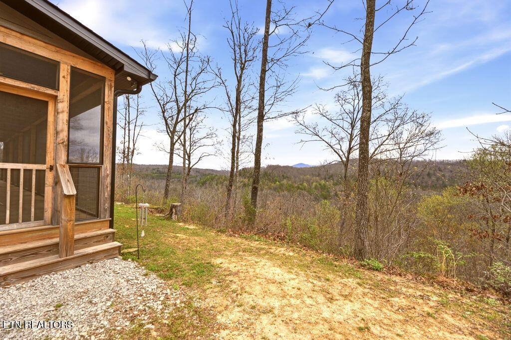 1159 Emory Heights Road Lancing, TN 37770 - Photo 34 of 59 back deck from drive